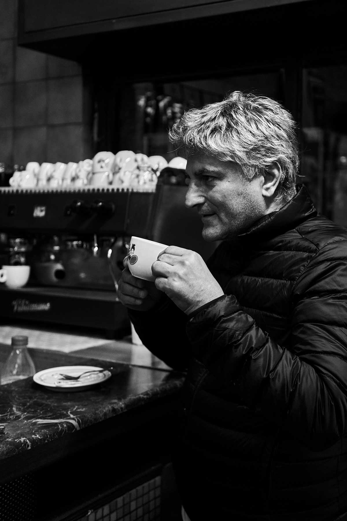 Rocco Princi sips espresso in a cafe